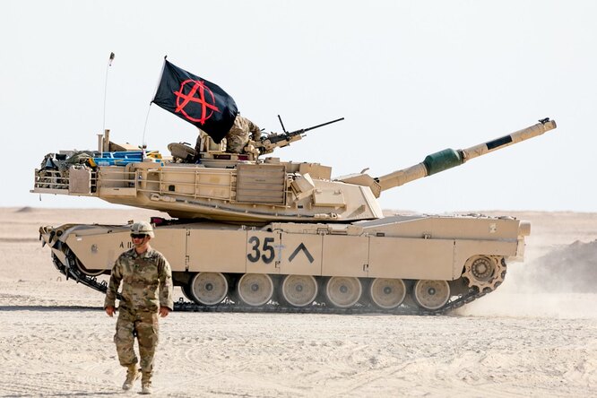 Что означают странные символы на танках в виде буквы V